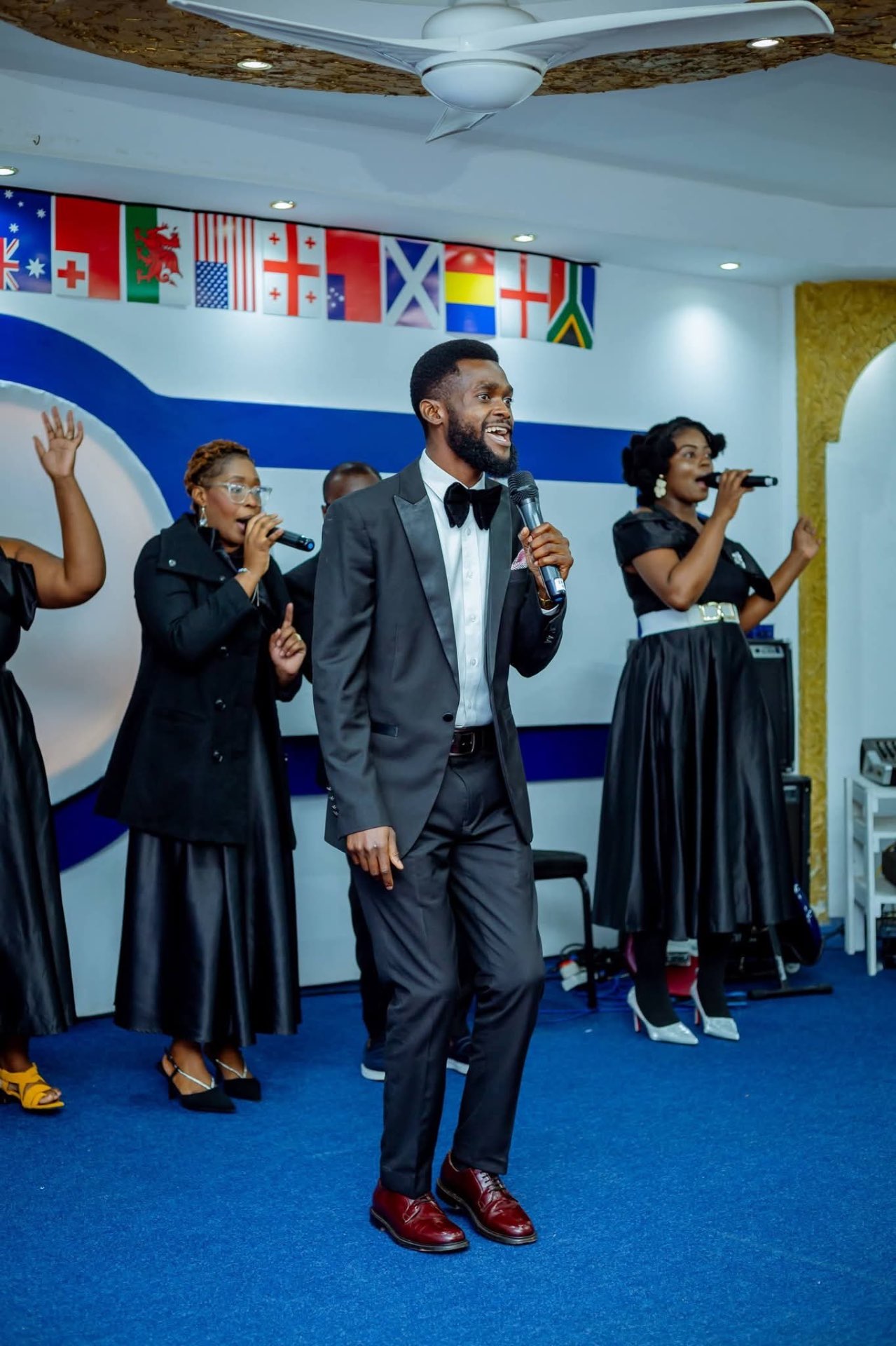 A worship leader ministering in song during a Sunday service